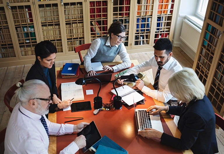 People working in law library