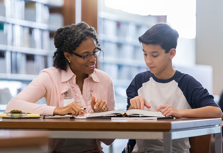 Reading specialist working with student