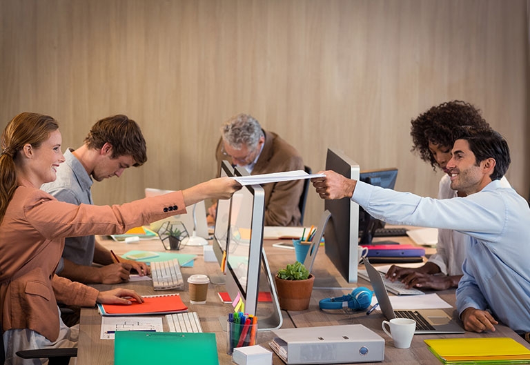 Writers working together in workplace