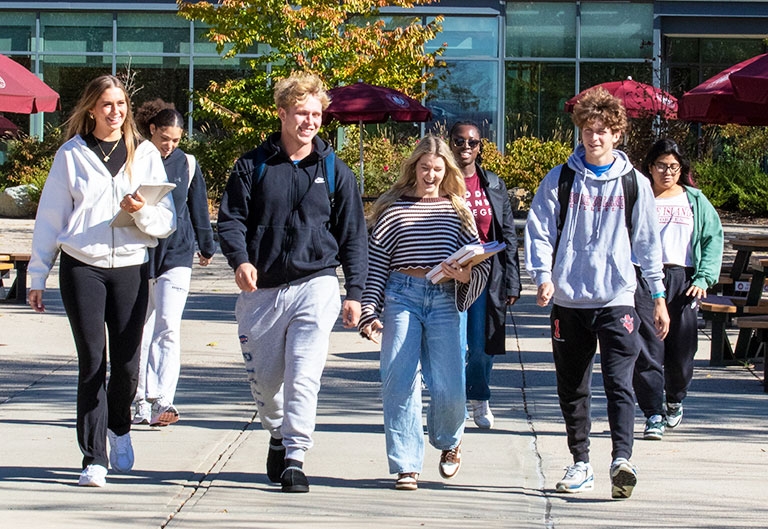 Students walking on campus quad