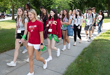 Students touring campus in summer