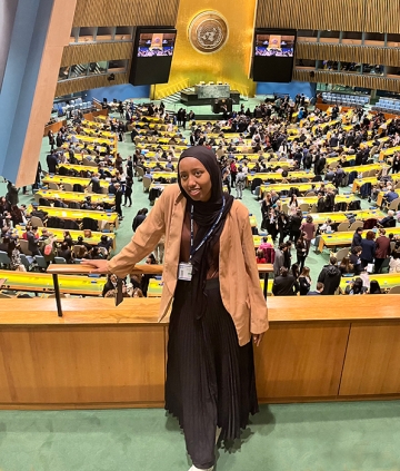 Student standing at the United Nations