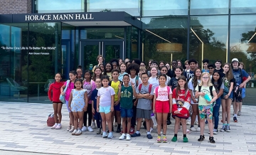 Group of students from the RIWP summer writing camp, outside of the Horace Mann building