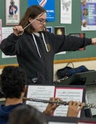 Zach Fulford, music major, conducting students