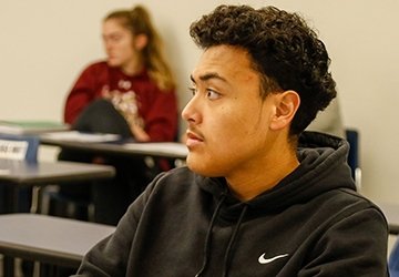 Accounting students listening in classroom
