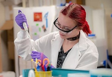 Student working in biology lab