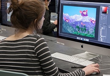 Student working on animation on a computer