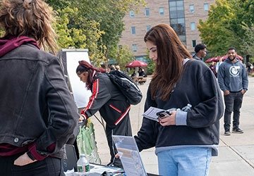 Student at table at fresh check day