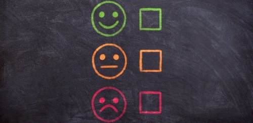 Faces on chalkboard