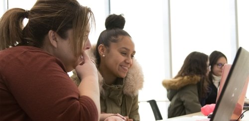 Two students at the Learning for Life Financial Aid session