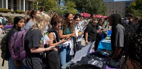 Student Activities Day crowd of students at table