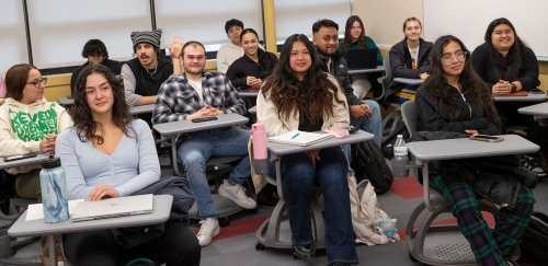 Students sitting at desks in class