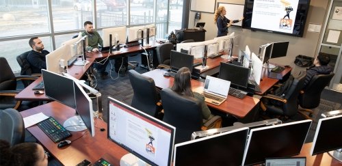Students being taught in the finance lab