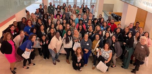 Conference photo of community health workers in RI
