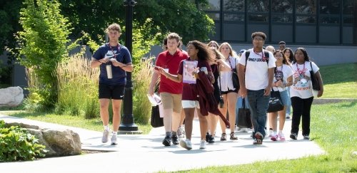Students on campus tour during summer with student ambassador