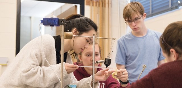 Students working in Ben Young physics lab