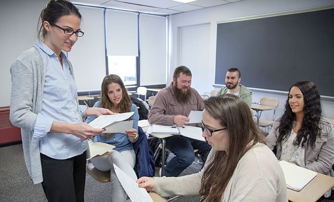 School psychology class, with faculty member interacting with students